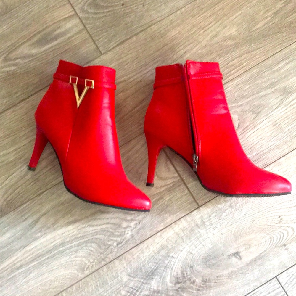 Beautiful red shoes worn twice